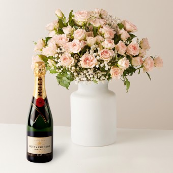 Ethereal Beauty: Bouquet of Roses and Gypsophila with Champagne